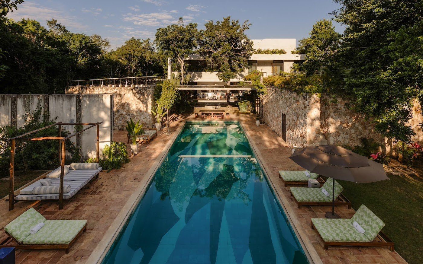 The long reflecting pool — the most photographed thing in the house, and it earns it.